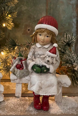 Godtbergsen - Pige på bænk, med hund og gaver